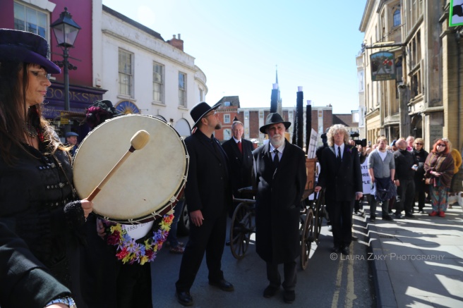 Crazy Horse’s coffin arrives at Lloyds Bank - photograph by Laura Zaky